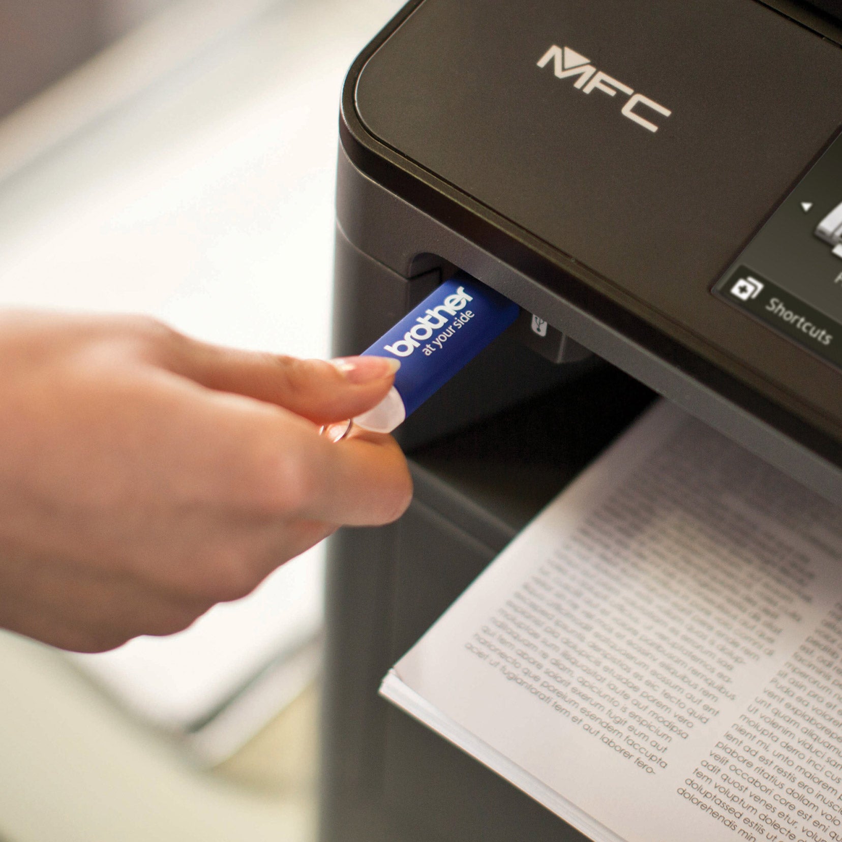 Brother MFC-L5900DWB Monochrome Laser All-In-One Printer with Bonus Ream of Paper