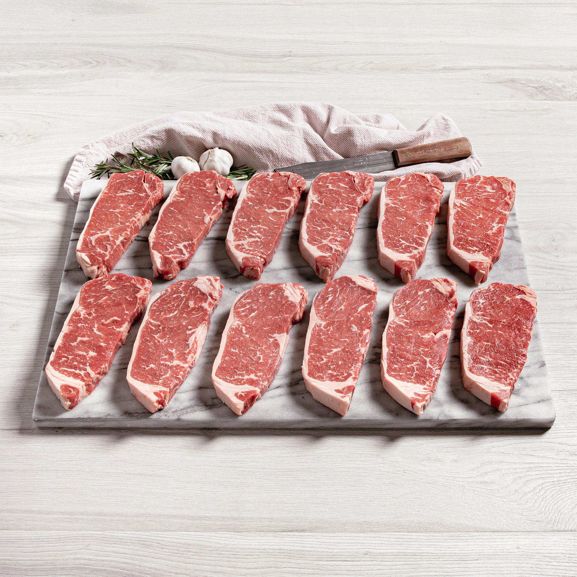 Rastelli's USDA Choice Black Angus NY CC Strip Steak (12/10 Oz. Per Steak), 12 Total Count, 7.5 Lbs. Total