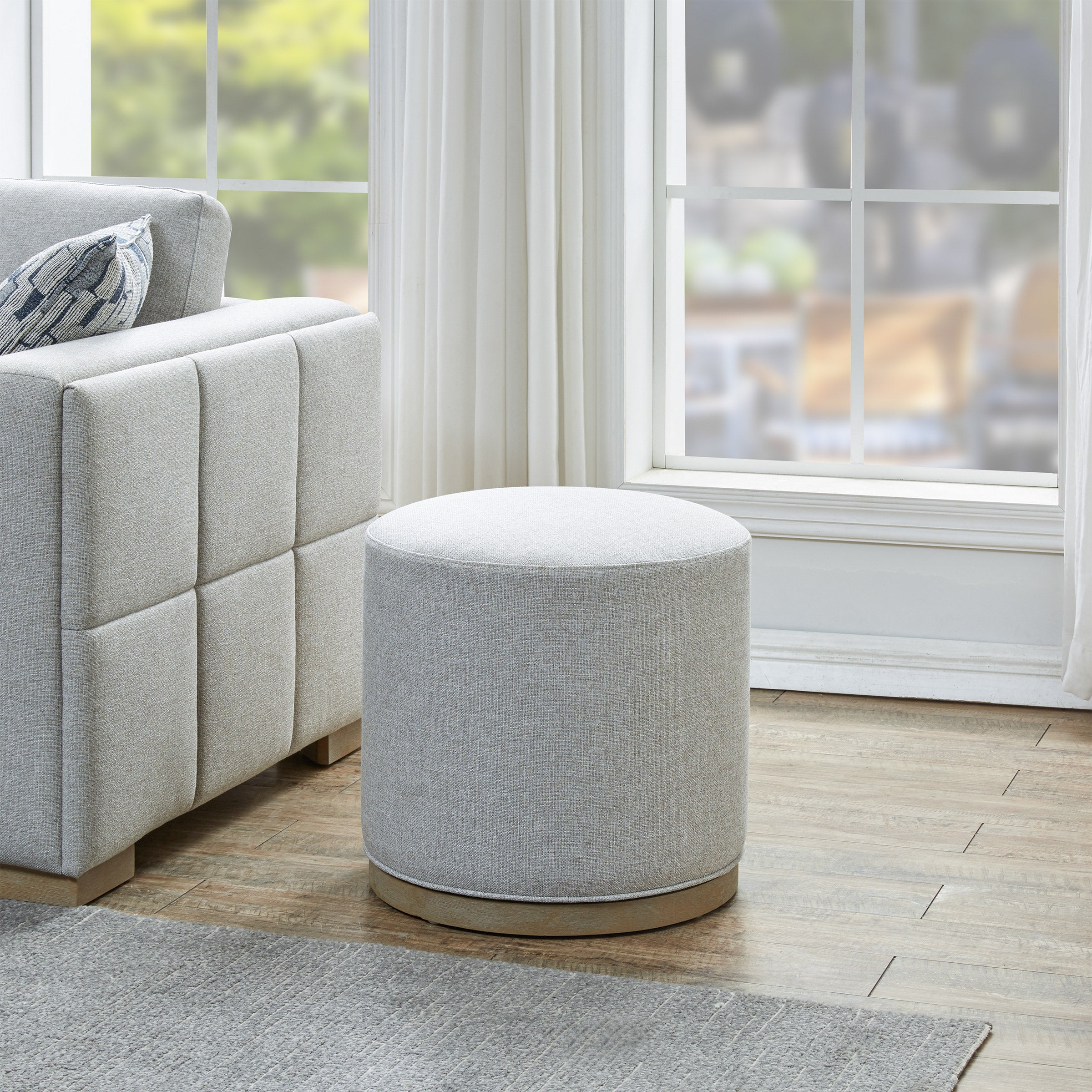 Drayden Fabric Swivel Ottoman